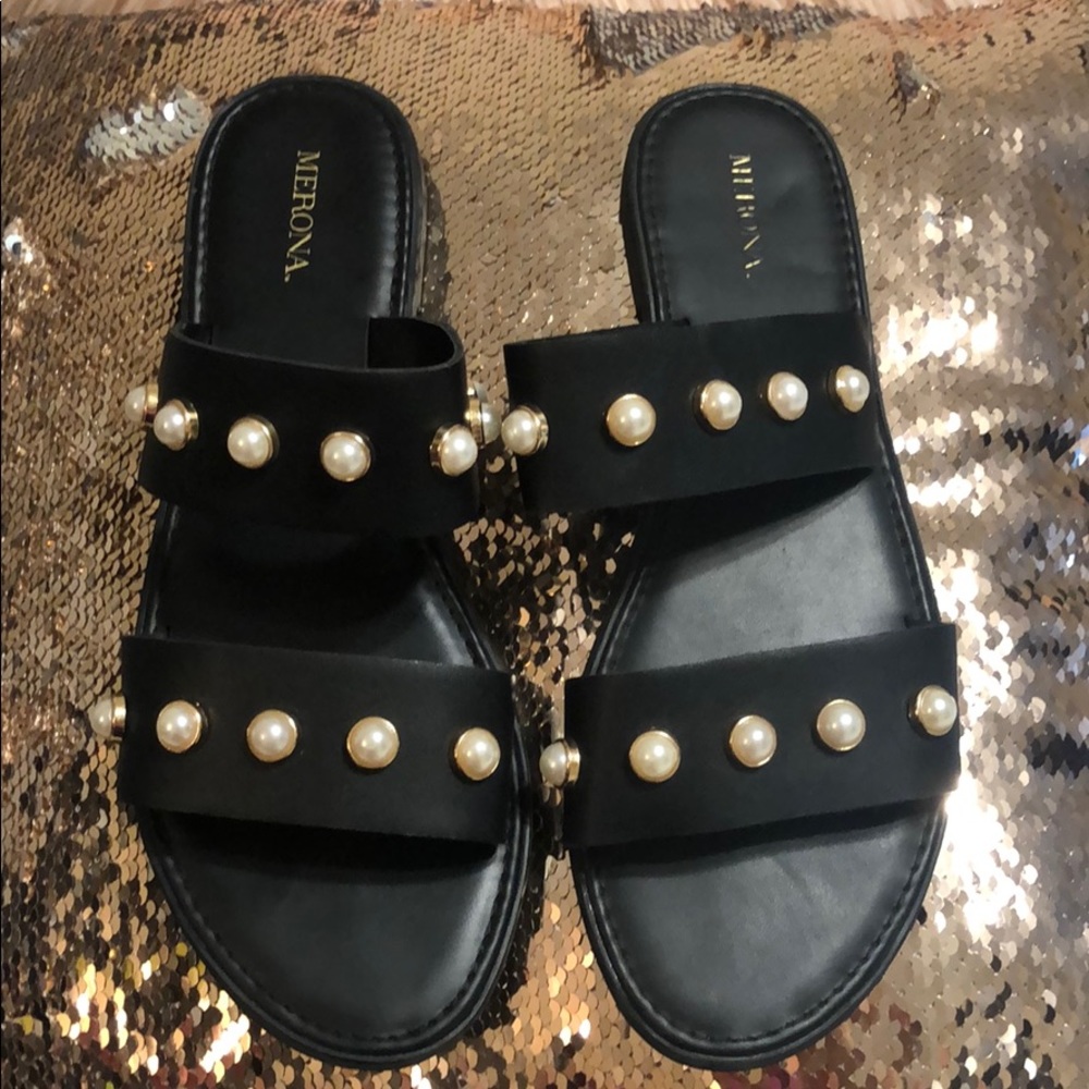 Black sandal with pearl and gold embellishment